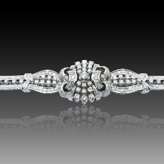 Bracelet Or gris 18 K avec 5.0 Cts de Diamants environ G-H-VS-SI