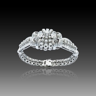 Bracelet Or gris 18 K avec 5.0 Cts de Diamants environ G-H-VS-SI