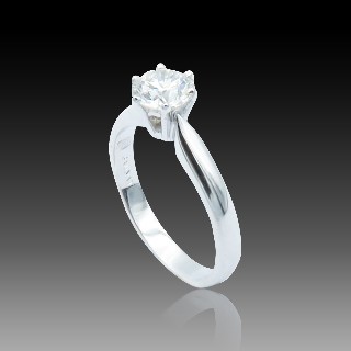 Solitaire en Or gris 18 Cts avec Diamant brillant 0.71 Cts G-SI1 (HRD)