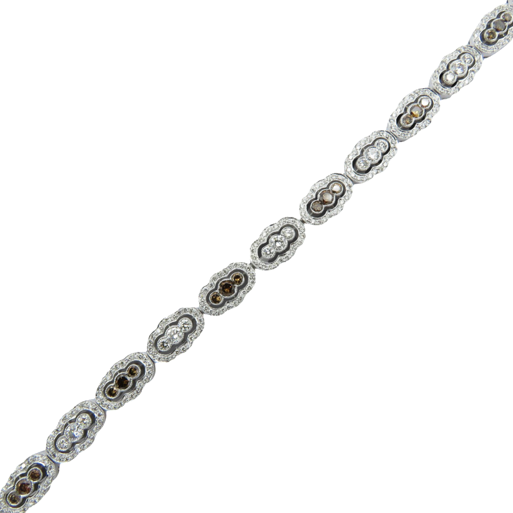 Bracelet articulé en or gris 18 Cts avec 343 diamants  blancs et bruns . 3.80 Cts