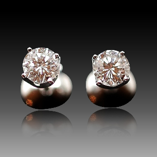 Puces d'oreilles Or gris 18k avec 2 Diamants brillants 0.48 Cts F-G et VVS1-PUR 10X.