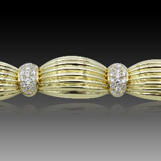 Bracelet O.J Perrin en Or 18k massif avec diamants brillants vers 1980.