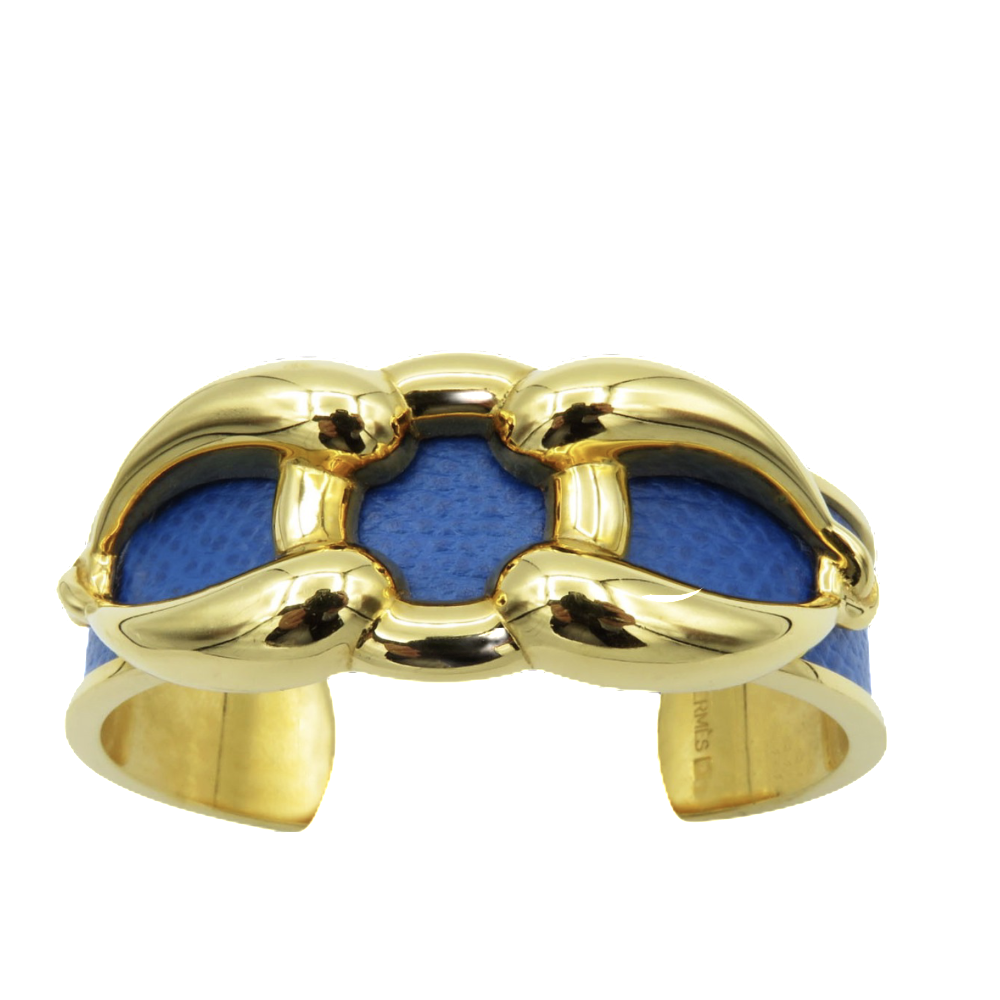 Bracelet Hermes Métal Doré Rigide ouvert avec cuir bleu . Bracelet Hermes Métal Doré Rigide ouvert avec cuir bleu .