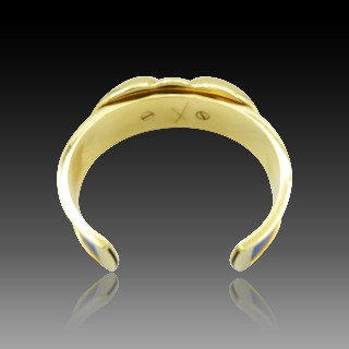 Bracelet Hermes Métal Doré Rigide ouvert avec cuir bleu . Bracelet Hermes Métal Doré Rigide ouvert avec cuir bleu .