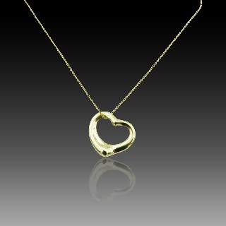 Collier pendentif Coeur Tiffany en or jaune 18 k "Olga Peretti"