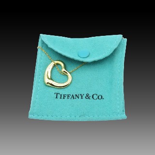 Collier pendentif Coeur Tiffany en or jaune 18 k "Olga Peretti"