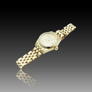 Montre Rolex Oyster Lady Datejust Or 18k Massif de 1988 . Cadran jaune. Ref : 69173 . Montre Rolex Oyster Lady Datejust Or 18k Massif de 1988 . Cadran jaune. Ref : 69173 .