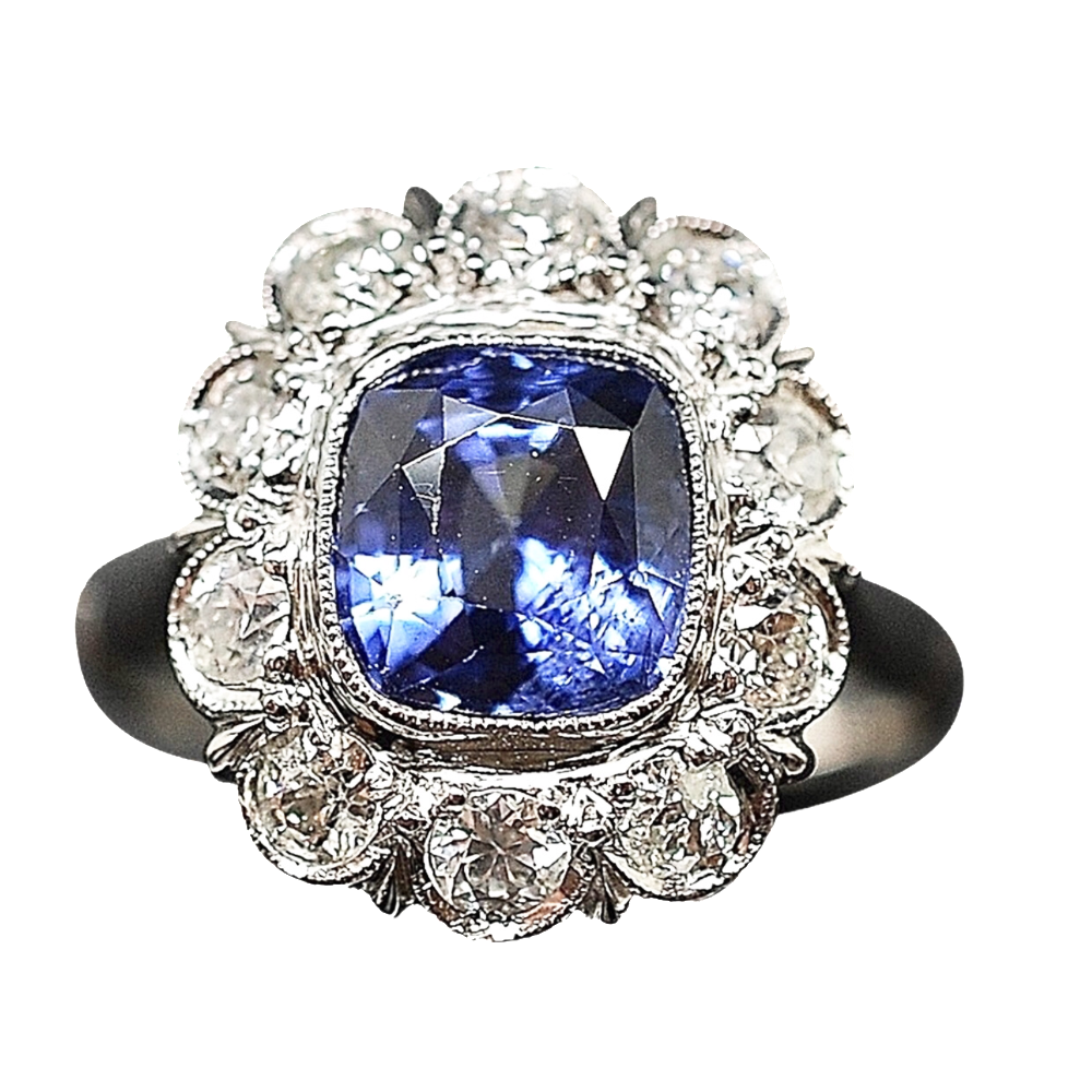 Bague entourage en Or 18K et platine vers 1920, Saphir Ceylan  et Diamants.