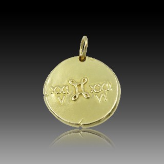 Médaille Zodiaque Van Cleef & Arpels "Gemeaux" en Or jaune 18k massif vers 1970.