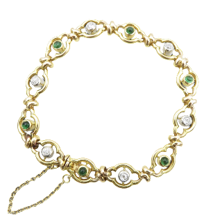 Bracelet vers 1900 en or 18k et Platine avec Emeraudes Cabochons et Diamants