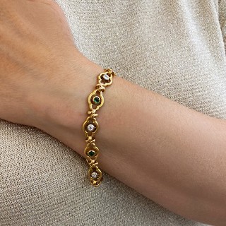 Bracelet vers 1900 en or 18k et Platine avec Emeraudes Cabochons et Diamants