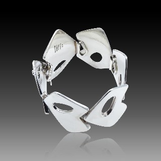 Bracelet Articulé 6 motifs en Argent massif. 18 cm. 147,30 Gr