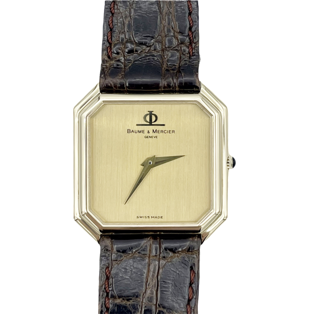 Montre Baume & Mercier Vintage Rectangulaire  Or jaune 18k mécanique Vers 1970.