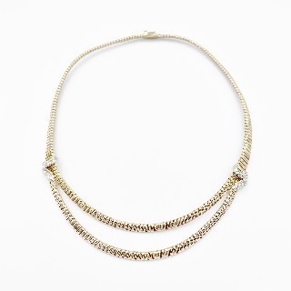 Collier OJ Perrin vers 1965 , Tubogaz Vers 1965 en Or, Platine et Diamants.