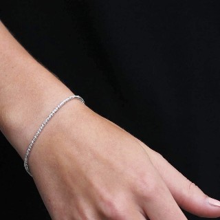 Bracelet ligne en or gris 18k avec 1.38 Cts de Diamants brillants. G-VS