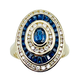 Bague Or jaune 18k avec Saphirs calibrés et Diamants brillants . Taille 54