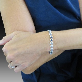 Bracelet articulé en or gris 18 Cts avec Diamants et Saphirs