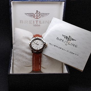 Montre Breitling "Callisto" dame en acier et or quartz . 34 mm. boucle déployante