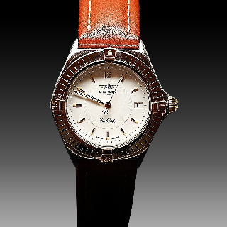 Montre Breitling "Callisto" dame en acier et or quartz . 34 mm. boucle déployante