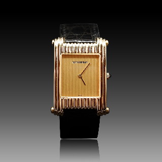 Montre Boucheron "Reflet"  grand modèle à quartz en or jaune 18k .