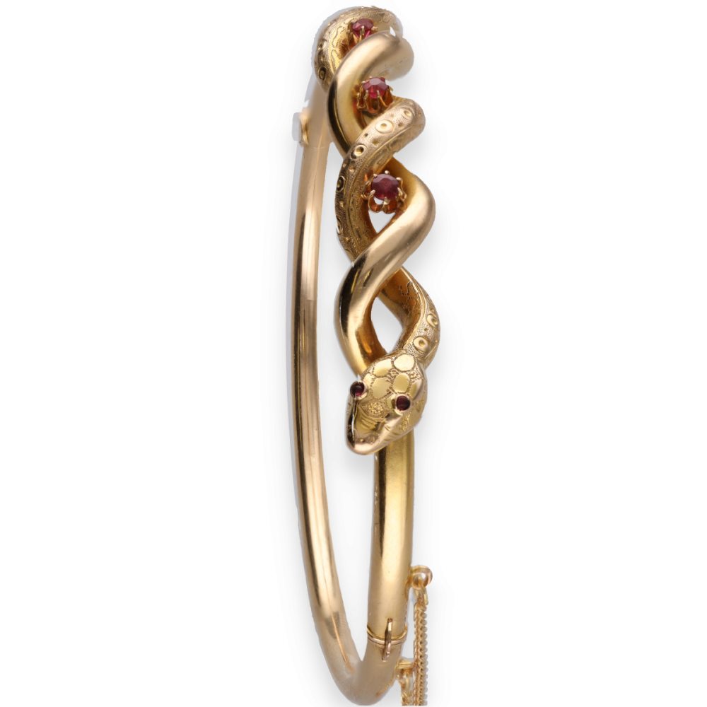 Bracelet Serpent ouvrant Vers 1900 en or jaune 18 Cts avec rubis.