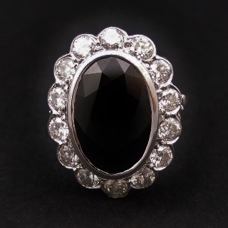 Bague entourage en Or 18K et platine vers 1950, Saphir et Diamants.