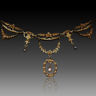 Collier Draperie vers 1910 en or jaune 18k et perles fines .  