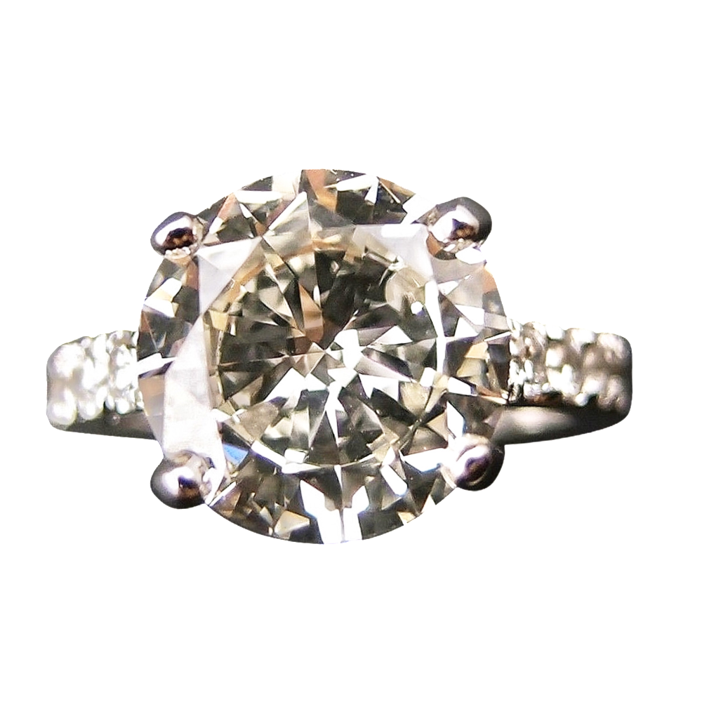 Solitaire en or gris 18k avec Diamant brillant 3.04 Cts M-VS1 + 0.30Cts.