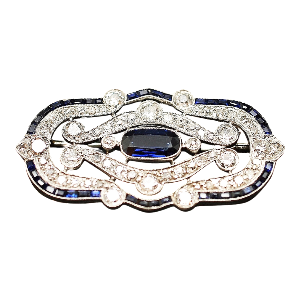 Broche en Or 18k et Platine Art Déco avec saphirs et Diamants. Broche en Or 18k et Platine Art Déco avec saphirs et Diamants.