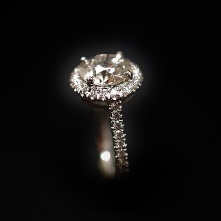 Solitaire en platine avec Diamant brillant 2.40 Cts J-VS2 + 0.40 Cts.