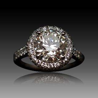 Solitaire en platine avec Diamant brillant 2.40 Cts J-VS2 + 0.40 Cts.