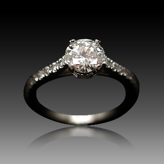 Solitaire Diamant 0.93 Cts E-VVS2 en platine + 0.32 Cts.