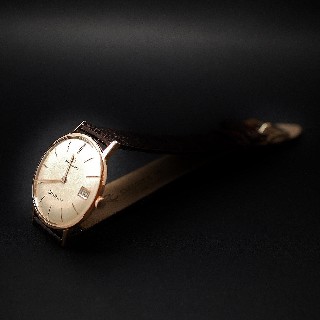 Montre Eterna Vintage "Centenaire" Homme en Or rose 18k Automatique Vers 1960.