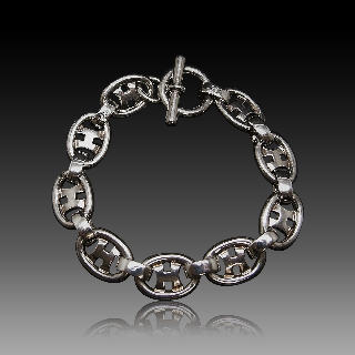 Bracelet Hermes Vintage en Argent. Vers 1980. maille Ovale