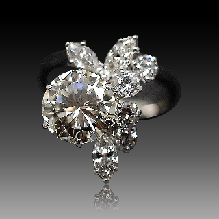 Bague en or gris 18k avec un Diamant brillant de 2.47 Cts Qualité L-VS1 + 1.0 Ct  G-VS.