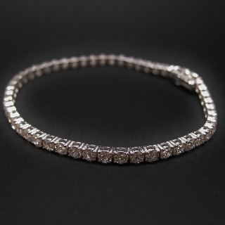 Bracelet ligne en or gris 18k avec 7.01 Cts de Diamants brillants Extrablancs.