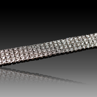 Bracelet en or gris 18 Cts avec 13.58 Cts de Diamants G-VS.