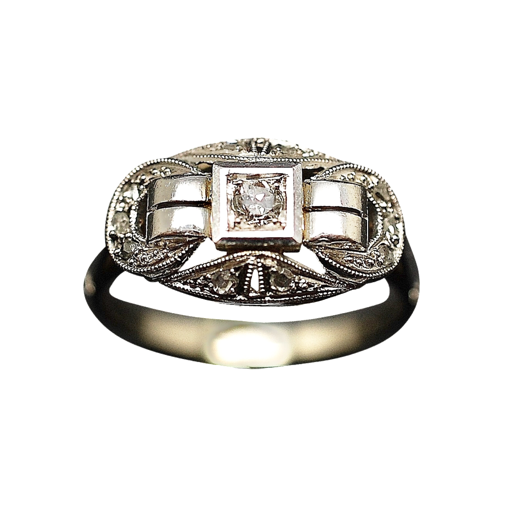 Bague en Or 18 Cts et platine avec 0.15 Cts  de Diamants . Taille 54