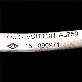 Bracelet Louis Vuitton en or gris 18k massif  "Lockit". Taille 15.