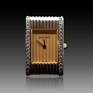 Montre Boucheron Reflet Dame Petit Modèle en Or Jaune 18k avec diamants quartz .