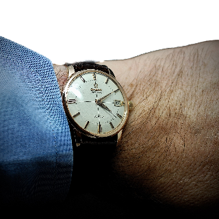 Montre Omega Vintage ref: 14703 Automatique en Or rose 18k  Vers 1960. 33 mm.