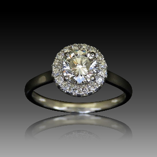 Solitaire en Or 18 Cts avec Diamant brillant 0.66 Cts H-VS2 + 0.30 Cts.