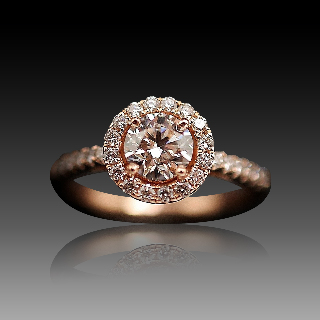 Solitaire en or rose 18 Cts avec Diamant brillant 0,72 Cts F-VS2 + 0.30 Cts.