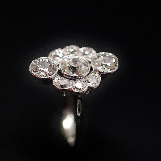 Bague entourage vers 1920 en platine avec 2.0 Ct  de Diamants taille ancienne .Taille 56