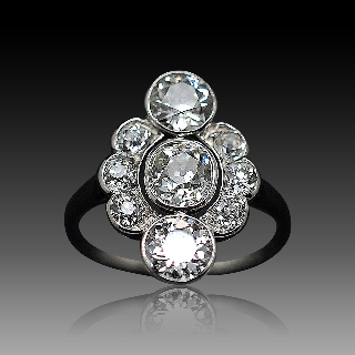 Bague entourage vers 1920 en platine avec 2.0 Ct  de Diamants taille ancienne .Taille 56