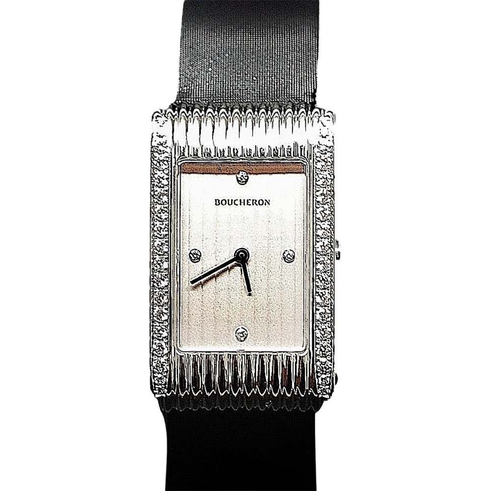 Montre Boucheron "Reflet" de Dame Moyen modèle acier et Diamants .