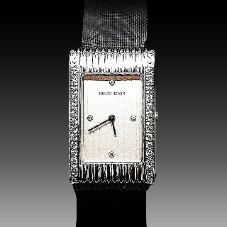 Montre Boucheron "Reflet" de Dame Moyen modèle acier et Diamants .