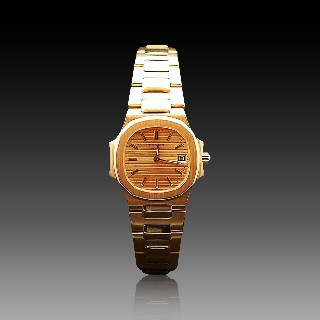 Montre Patek Philippe Nautilus Dame Or jaune 18k de 1986. Quartz.