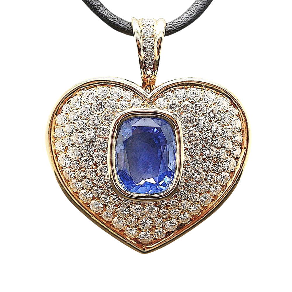 Pendentif Coeur en Or jaune 18k avec un saphir ceylan et diamants.