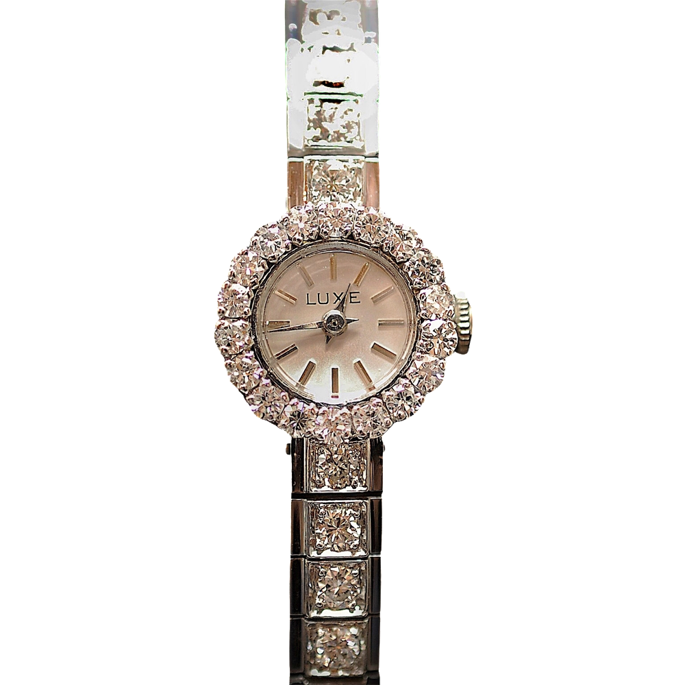 Montre Dame "Luxe" Or gris 18 K et platine avec 4.0 Cts de Diamants Vers 1965. Mécanique .